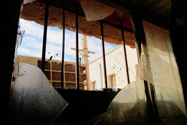 Hospital pharmacy window shattered by a nearby explosion, Bost Hospital, Helmand